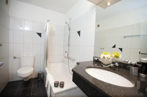 Koupelna v ubytování Hotel Alt Riemsloh