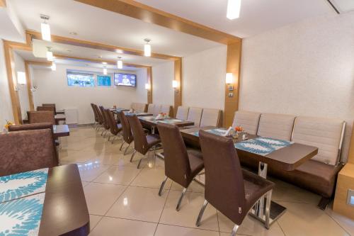 TV a/nebo společenská místnost v ubytování Hotel Port