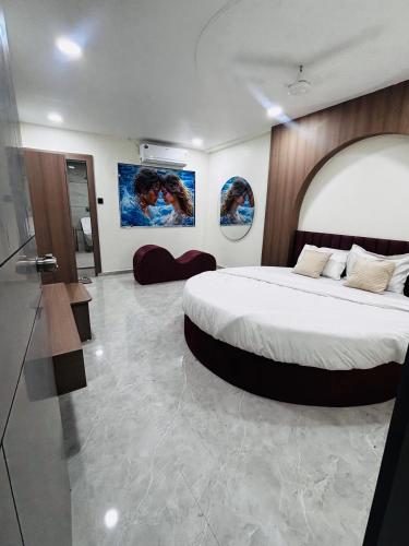 เตียงในห้องที่ Hotel Mb Prime