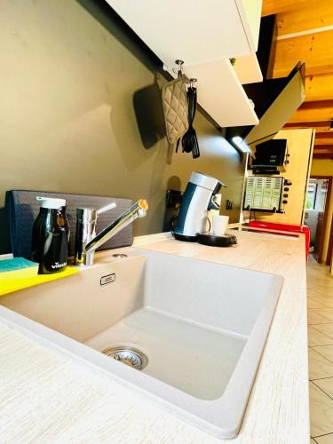 a kitchen counter with a sink in a kitchen at Ferienwohnung Südtor in Geisingen
