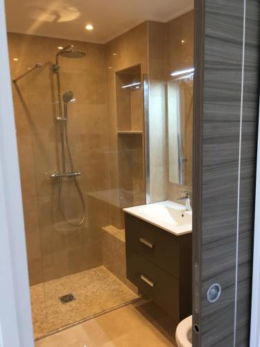 a bathroom with a shower and a toilet and a sink at STUDIO by the croisette in Cannes