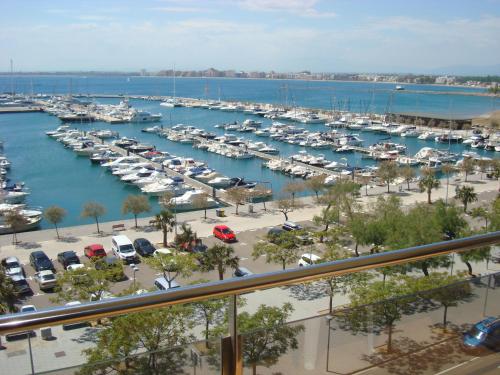a view of a marina with boats in the water at Hotel Univers in Roses
