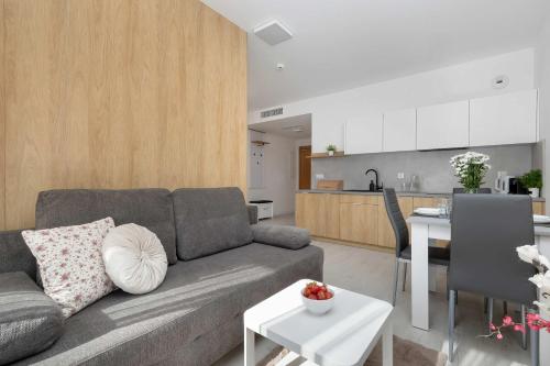 Elegant Apartments in Mielno with Rooftop Seasonal Pool by Noclegi Renters