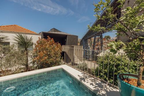 Bridge & Pool Retreat by Vacationy