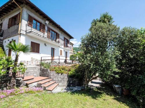 a house with a staircase in front of it at Apartment Piersa by Interhome in Mergozzo