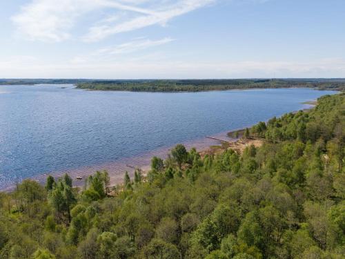 an aerial view of a beach next to a body of water at Holiday Home Extorp by Interhome in Hamneda