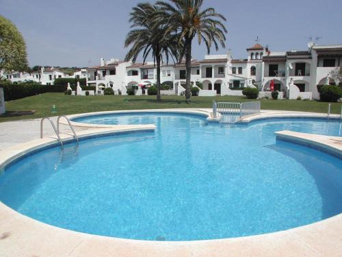 a large swimming pool in front of a large house at Hermitage 103 in Torroella de Montgrí