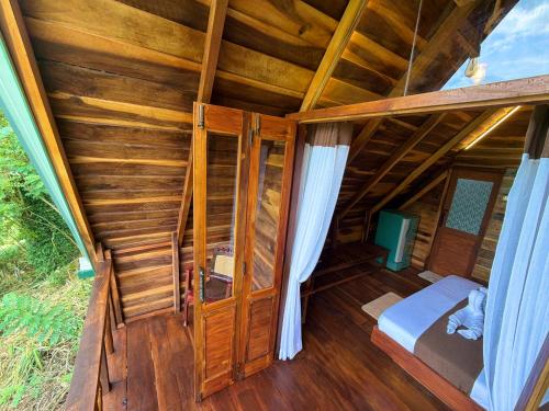 an inside view of a room in a house at Mr Arachchi Luxury Cabana in Ella