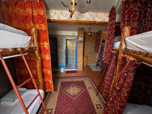 an overhead view of a room with two bunk beds at Tizaou Guest House in Taghazout