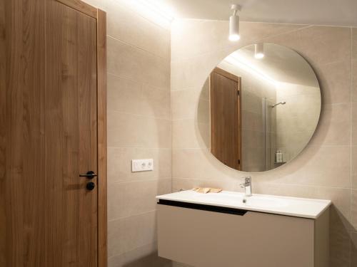 a bathroom with a sink and a mirror at Meral Units in Fuengirola