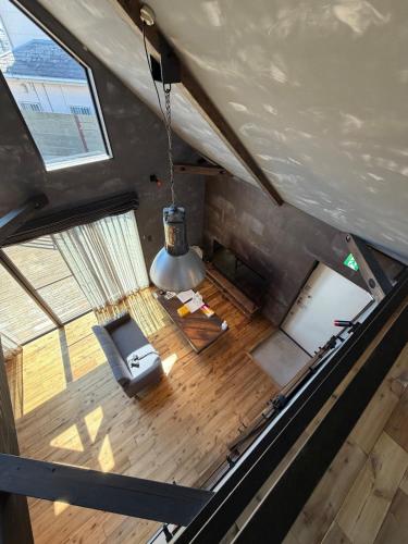 an overhead view of a living room in a tent at Beringei house Kujukuri in Katakai