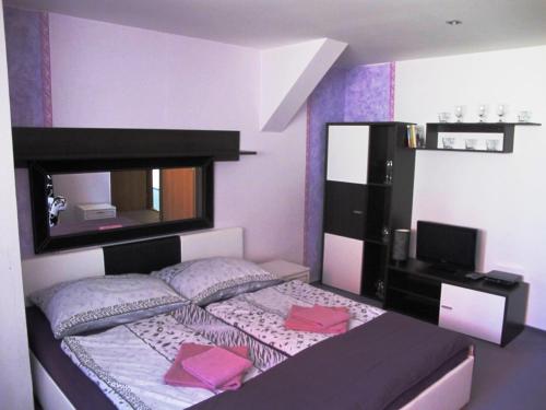 Katil atau katil-katil dalam bilik di Hotel U Lišky