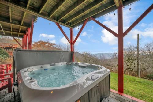 a hot tub on a gazebo at Ace of Diamonds in Seven Devils