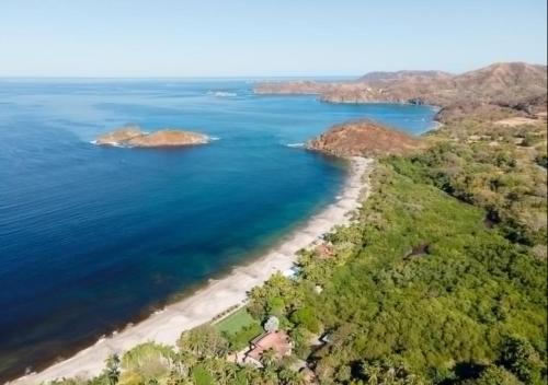 an aerial view of a beach and the ocean at Garden Pool & 5-minutes Walk to Beach in Potrero