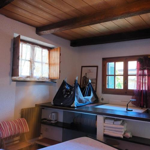 a kitchen with a counter with bags on it at Fontantica di Vernazza in Vernazza