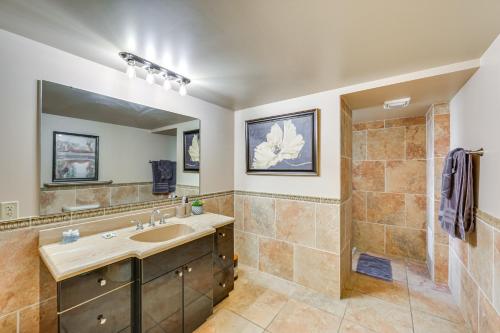 a bathroom with a sink and a shower at Work, Play & Explore: 9-Unit New Kensington Base in New Kensington