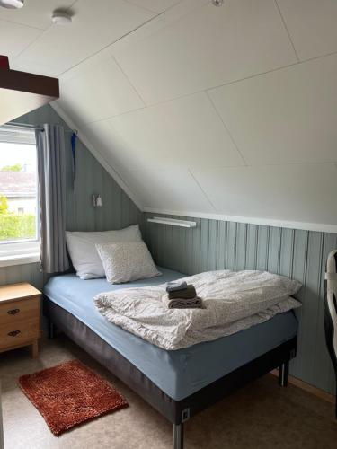 a bedroom with a bed in a room at Kronstad in Alta
