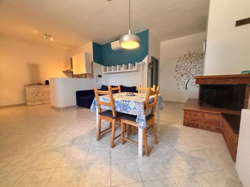 a dining room with a table and some chairs at casa villa degli ulivi in Colonnella