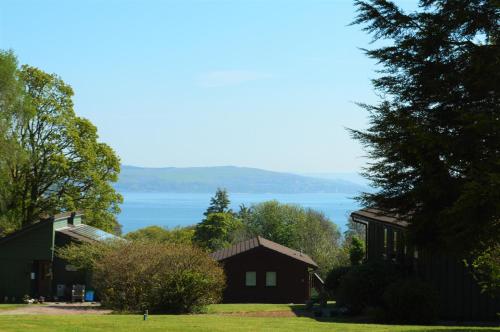 a view of the lake from a house at Loch View Lodge in Dunoon