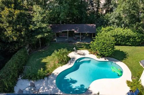 an overhead view of a swimming pool in a yard at Coastal Lane - Entire in Jacksonville