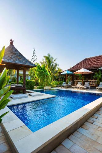 an image of a swimming pool at a resort at Uluwatu Jungle Villa in Uluwatu