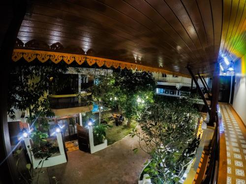 an overhead view of a room filled with plants at i Lanna House in Chiang Mai