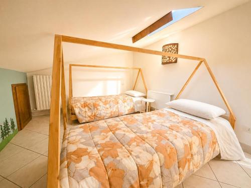 a bedroom with a bed in a room at Casa Campomonte 2 in Poppi Stazione