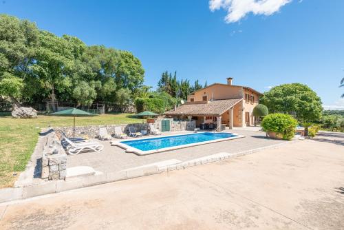 an estate with a swimming pool and a house at Luxury Villa Es Molinet in Alcudia