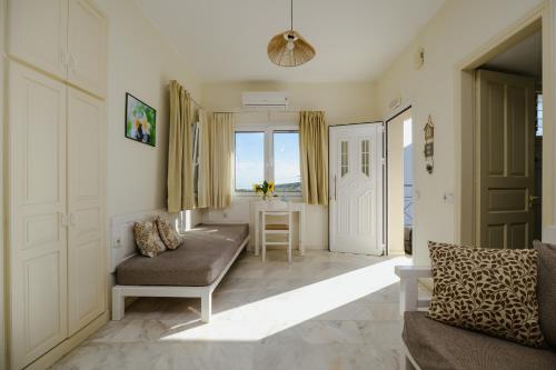 a living room with a couch and a table at Dialinas Apartments in Istro