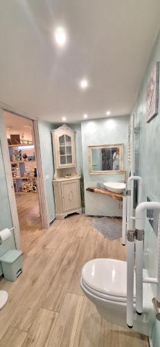 a bathroom with a sink and a toilet in it at Alessandra‘s House in Arezzo