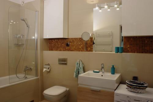 Koupelna v ubytování Apartament Flotylla Międzyzdroje 60 m2