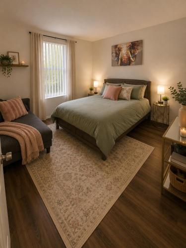 a bedroom with a large bed and a window at Ocean Breeze Stay Near Airport LAX & Stadium in Los Angeles