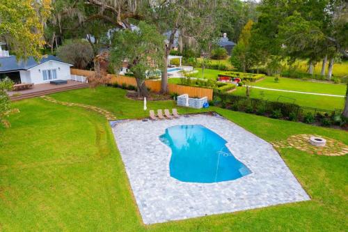 an overhead view of a backyard with a swimming pool at Waterfront Paradise Dock Pool Boathouse in Jacksonville