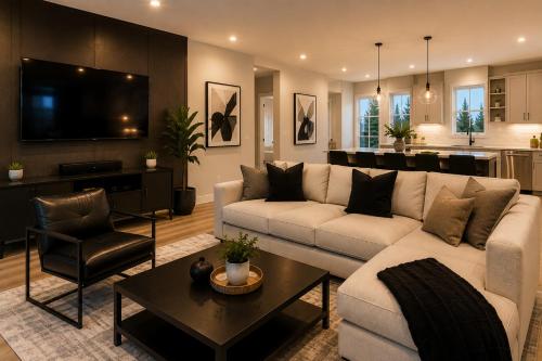 a living room with a white couch and a table at Collin Creek Executive Residences in Plano
