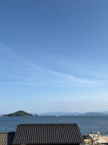 a view of a large body of water at 海辺の宿なみとけ in Shodoshima