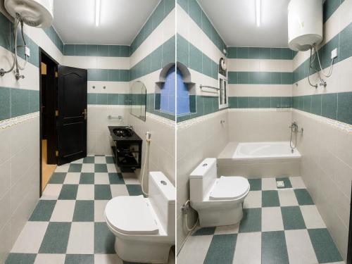a bathroom with two toilets and a sink and a tub at Al Shorooq Residential Complex مجمع الشروق السكني in Salalah