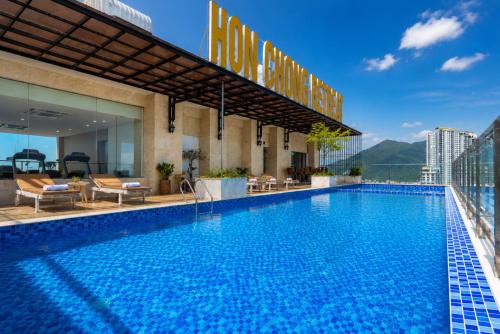 a swimming pool on the roof of a building at Hon Chong Retreat Hotel Nha Trang in Nha Trang