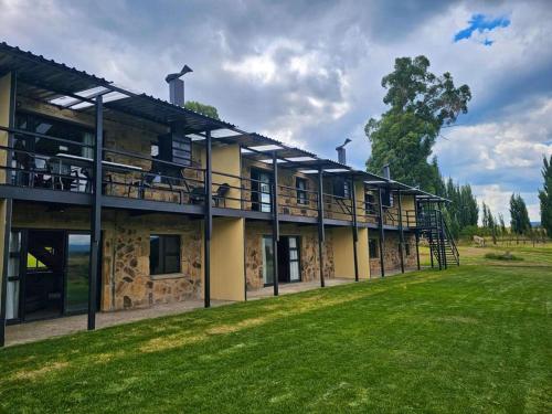 a building with balconies on the side of it at Clarossouw in Clarens