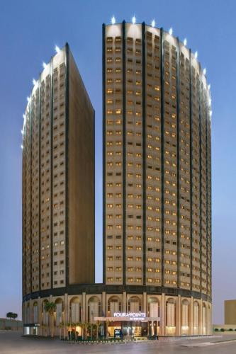 a large building with two tall buildings at Four Points By Sheraton Riyadh Khaldia in Riyadh