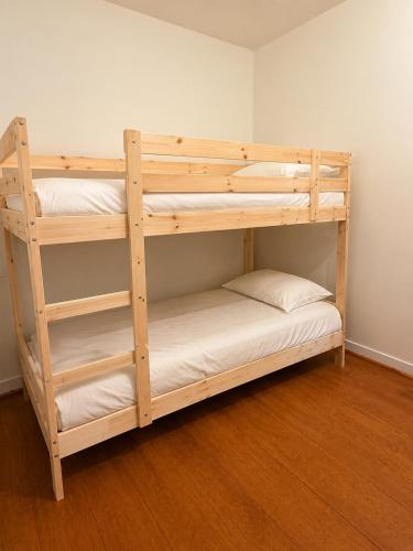 a couple of bunk beds in a room at Jaca Stone in Banaguás