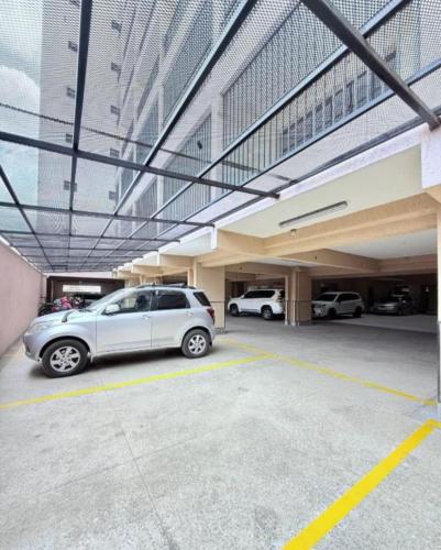 a car parked in a parking lot in a building at The Loft 21 Ngara, Nairobi in Nairobi