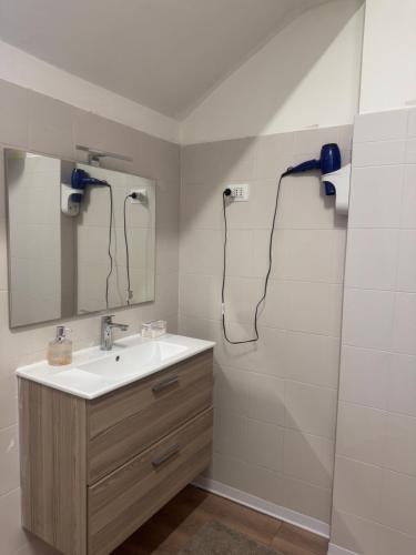 a bathroom with a sink and a mirror at Firenze inn 21 Florence in Florence