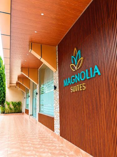 a mazda sign on the side of a building at Magnolia Suites B&B in Dar es Salaam