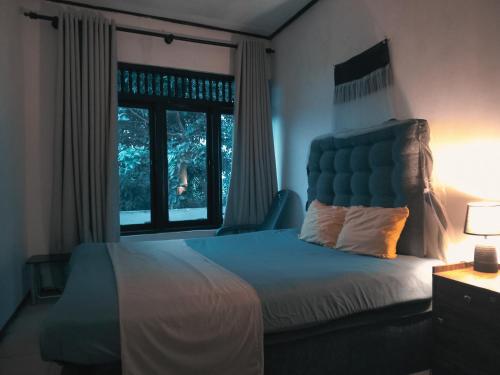 Llit o llits en una habitació de Cloud Nine