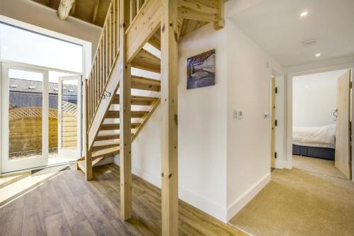 a room with a staircase and a bedroom at 1 Bed in Barrow oc-b42641 in Barrow