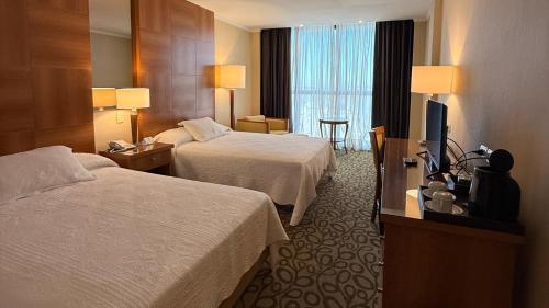 Turismo Hotel Casino — Room
