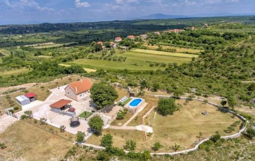 an aerial view of an estate with a house at Potkova in Lađevci
