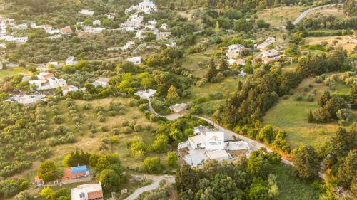 an aerial view of a house on a hill at Aroma Zia Residences 2 in Lagoúdi Zía