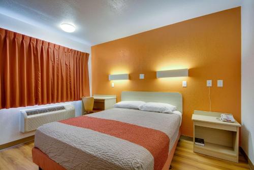 Ένα ή περισσότερα κρεβάτια σε δωμάτιο στο Avera Suites