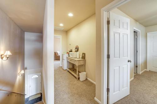 a hallway with a door leading to a room at Sunset View Deck! Lake Eufaula Family Getaway in Stigler